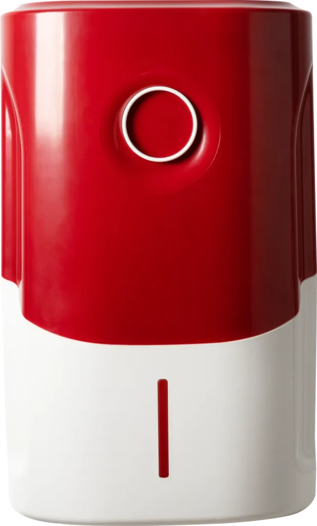 Equipo compacto de ósmosis inversa en rojo y blanco, visto de frente